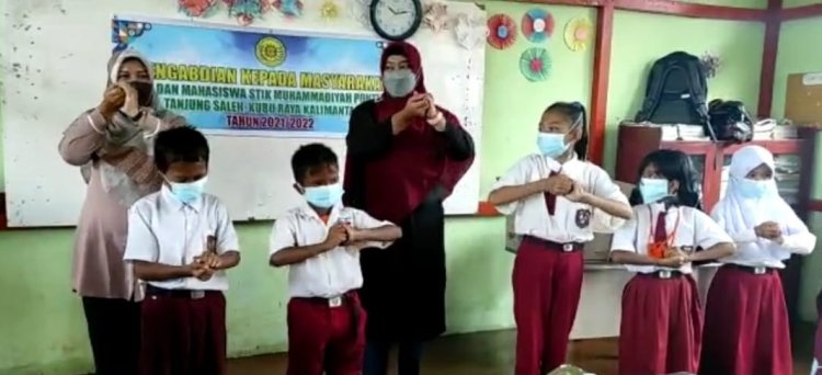 UPAYA PENCEGAHAN PENULARAN COVID 19   MELALUI  PEMBIASAAN  CUCI TANGAN 6 LANGKAH   PADA SISWA SD 11